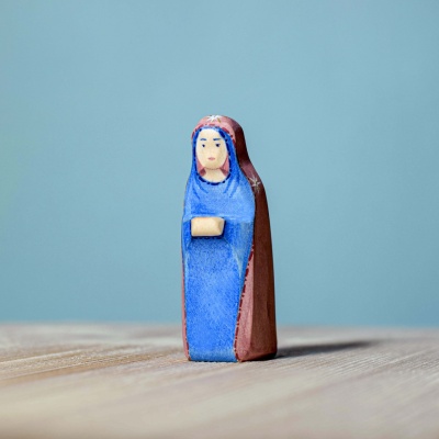 Artisanal BumbuToys figurine of Saint Mary, embodying serenity