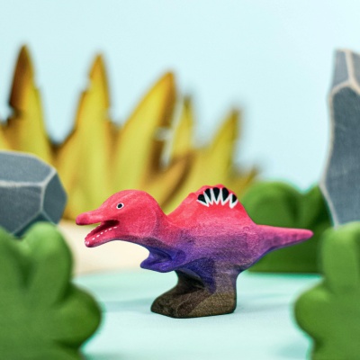 Wooden Spinosaurus Big and Baby toys in a play scene