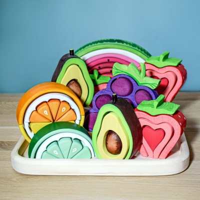 Handcrafted wooden grapes from BumbuToys, a tool for creative storytelling.