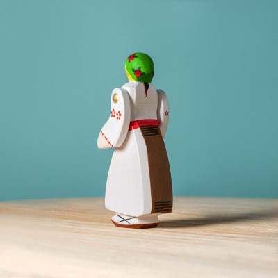Peasant Woman displayed on a child's bedroom bookshelf