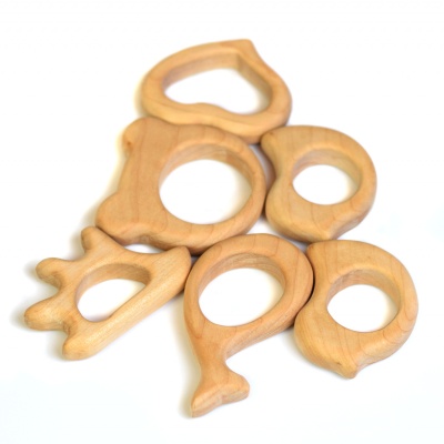 The BABY Bear Cub from BumbuToys: a wood-crafted teether for gentle gum comfort.