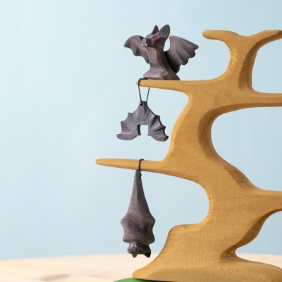 Wooden Bats Family Set with three bats hanging and perched on a wooden tree.