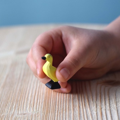 A cheerful wooden Ducklings figure from BumbuToys, capturing the essence of new beginnings.