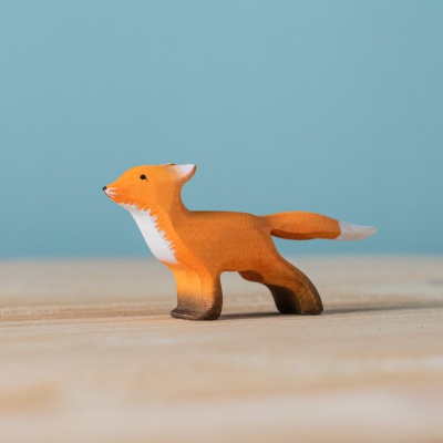 Vibrant Orange and White Wooden Fox Cub