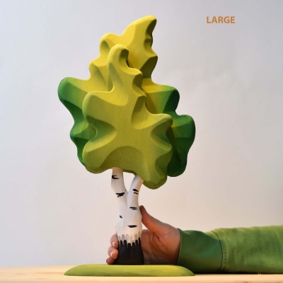 The Large Birch Green toy, where the detailed painting mimics the birch's natural summer foliage.