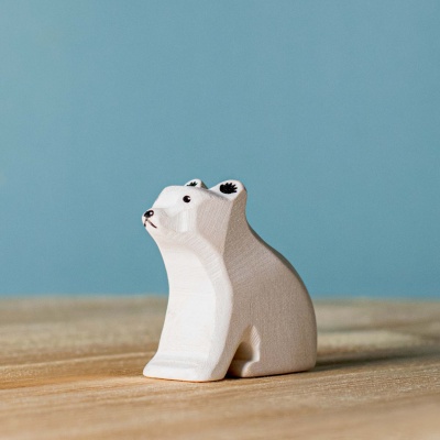 Artisanal wooden polar bears, a BumbuToys creation for imaginative Arctic exploration.