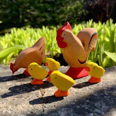 BumbuToys Wooden Chicks from a high angle, highlighting their size variations.