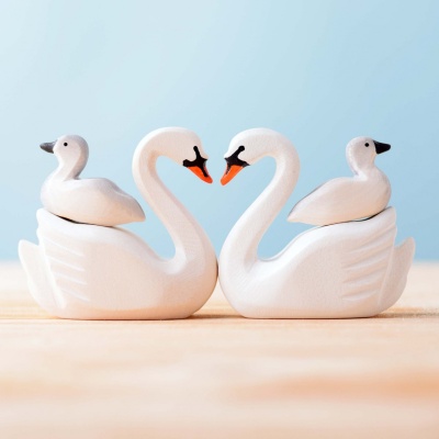 Artisanal young swan toy, a tender depiction of a cygnet.