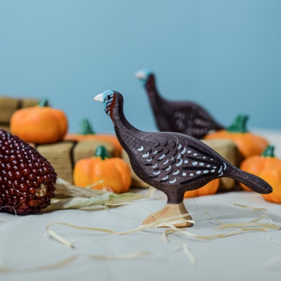 Artisan-crafted pumpkins from BumbuToys, encouraging creative decoration and play