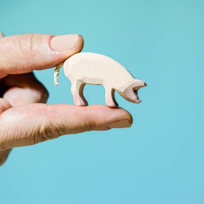 Sustainable wood Piglet Eating toy, bringing farm life to your home