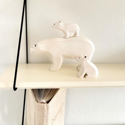 The Small Polar Bear figure, a BumbuToys creation, evokes the stark beauty of the Arctic.