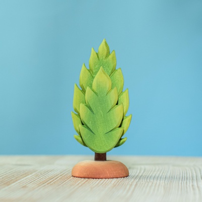 Hand-painted "Small Thuja" wooden tree by Bumbu Toys in vibrant green.