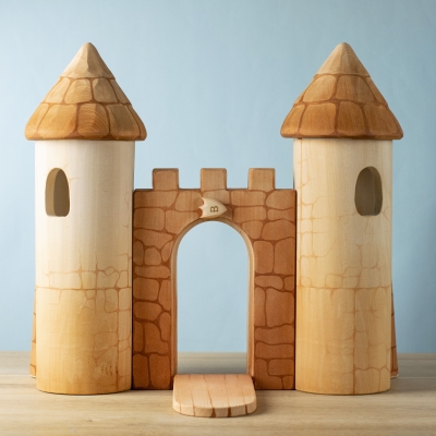 Front view of open wooden castle.