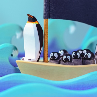 BumbuToys' Emperor Penguin Cub, a tiny treasure among wooden wildlife toys.