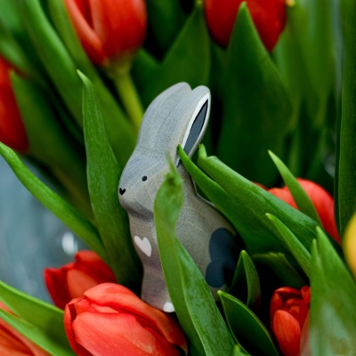 The Grey Sitting Rabbit, with its soft grey hues and loving heart shapes, a BumbuToys creation for all ages.