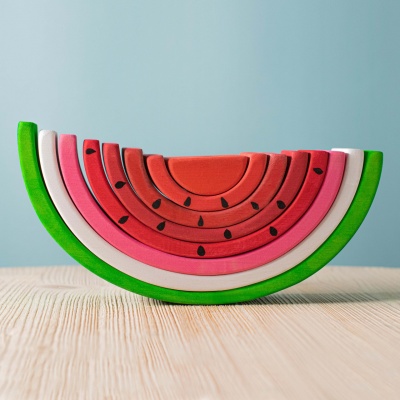 Juicy-looking watermelon toy slices that encourage creative stacking and sorting.