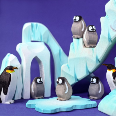 Charming Penguin Chicks atop a handcrafted Icy Cliff, a BumbuToys imaginative playset.