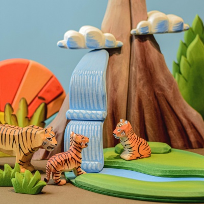 Eco-conscious wooden tiger cub sitting, ideal for nurseries