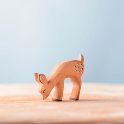Graceful deer and playful fawns wooden toy set.