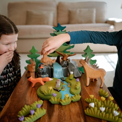 Stag and fawns wooden figures, bringing the wilderness home.