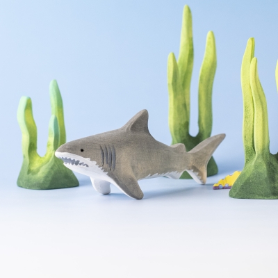 Wooden shark swimming among seaweed toys – Montessori ocean set