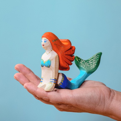 Child playing with the Shell and Mermaid set, diving into imaginative sea adventures