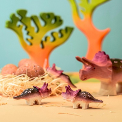 Wooden Triceratops family with eggs in nest
