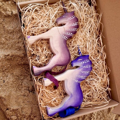 Gentle and Majestic Purple Unicorn for Young Enthusiasts