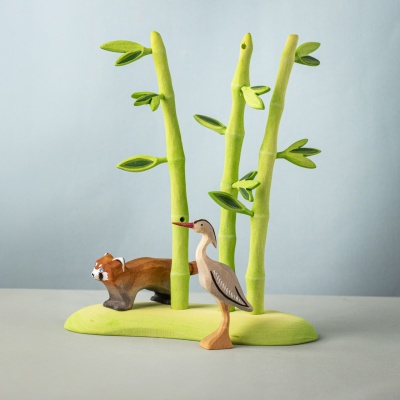 Bamboo set in a nature scene with red panda and heron