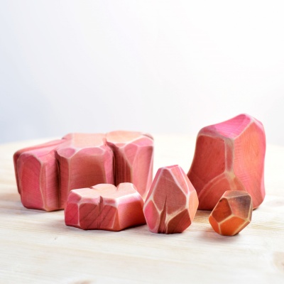 Sustainable playset by BumbuToys featuring Bumbi, Bimbi, and textured Savanna Rocks