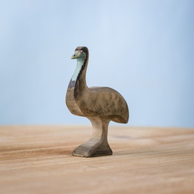 Male emu wooden figure on light background
