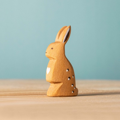 The handcrafted Careful Rabbit figure by BumbuToys, illustrating the cautious nature of this woodland creature.