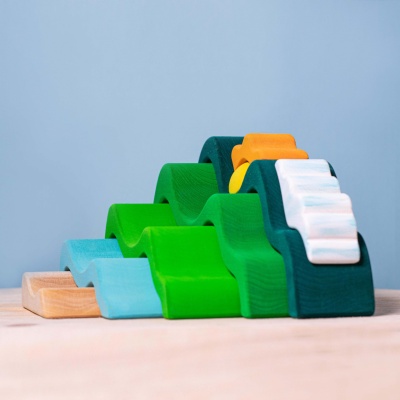 Fluffy white cloud and rolling hills puzzle, a BumbuToys creation for creative minds.
