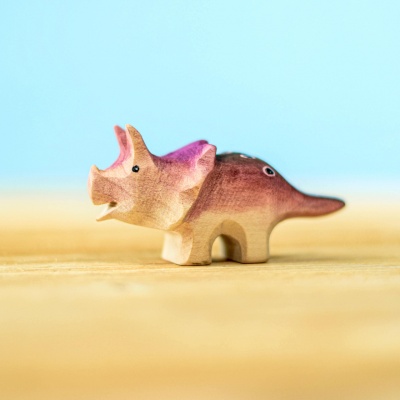 Handcrafted wooden baby Triceratops dinosaur figurine
