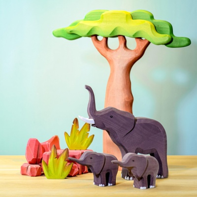 Immerse in the wild with BumbuToys' wooden Bumbi and Bimbi Elephants and Savanna Rocks