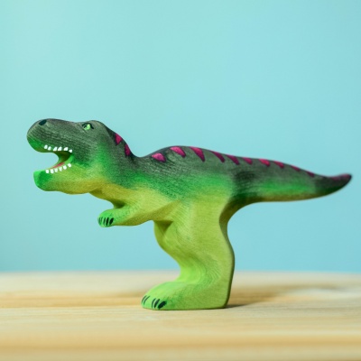 Close-up of eco-friendly large wooden T-Rex toy with detailed craftsmanship