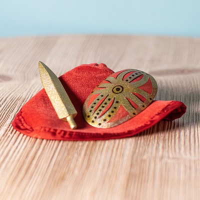 Wooden knight riding horse toy from a side view