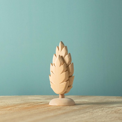 Natural wood thuja tree sculpture, untouched and eco-friendly.