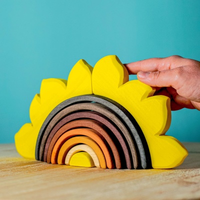 A stackable wooden sunflower that reflects the warm glow of summer fields.