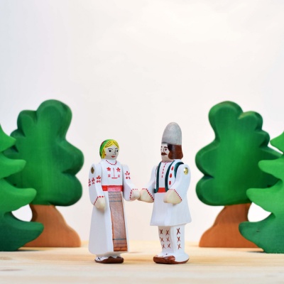 The Peasant toy posed with a thoughtful, leaning posture.