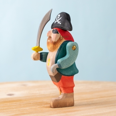 Side profile of pirate figure with sword and pirate hat