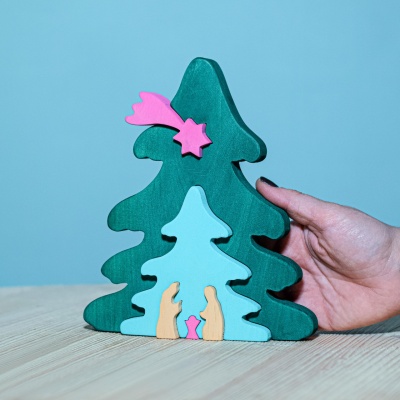 Bumbu Toys' Christmas Tree Puzzle in festive fuchsia, perfect for holiday decor