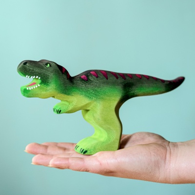 Child playing with the handcrafted Dinosaur T-Rex Big, eco-friendly