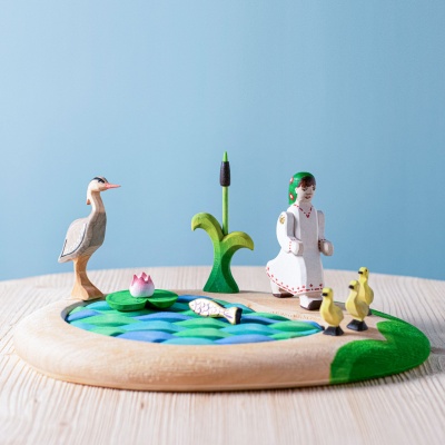 The Lake and Cattails Puzzle SET by BumbuToys, where each piece is a stroke of the aquatic landscape.