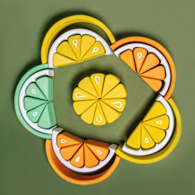 Wooden Lime Puzzle by BumbuToys, where learning and play merge with a citrusy flair.
