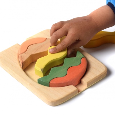 BumbuToys' Egg Puzzle, bringing a piece of the Easter tradition to life with its whimsical shape and colors.