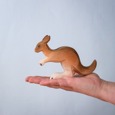 Adult kangaroo figure displayed in hand