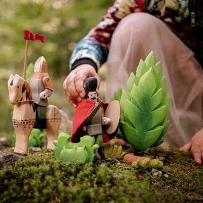 Michael the Brave toy alongside other storybook characters