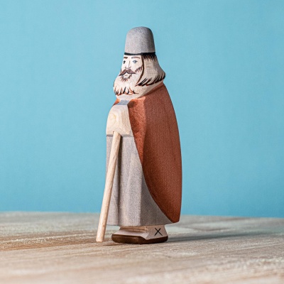 Image of the "Shepherd Standing with Beard" figurine standing proudly on a natural wooden surface.