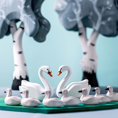 The wooden tableau of swans in a heart-shaped embrace, by Bumbu Toys.